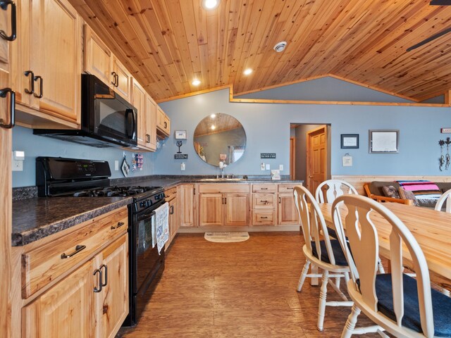 kitchen featuring black appliances, light brown cabinets, sink, vaulted ceiling, and wooden ceiling