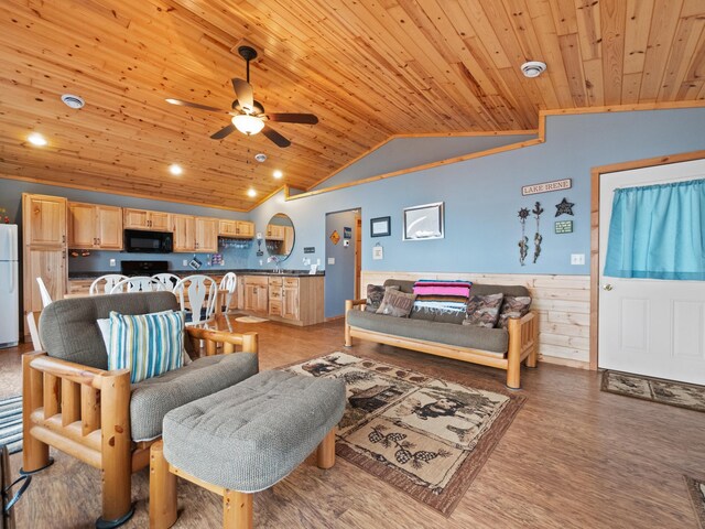 living room featuring wood-type flooring, ceiling fan, vaulted ceiling, and wooden ceiling