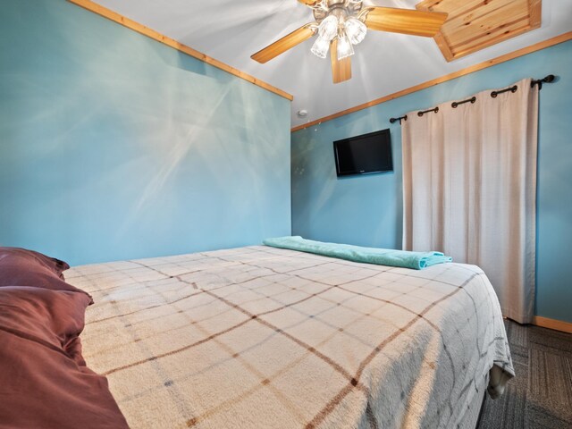 bedroom with ceiling fan and carpet floors