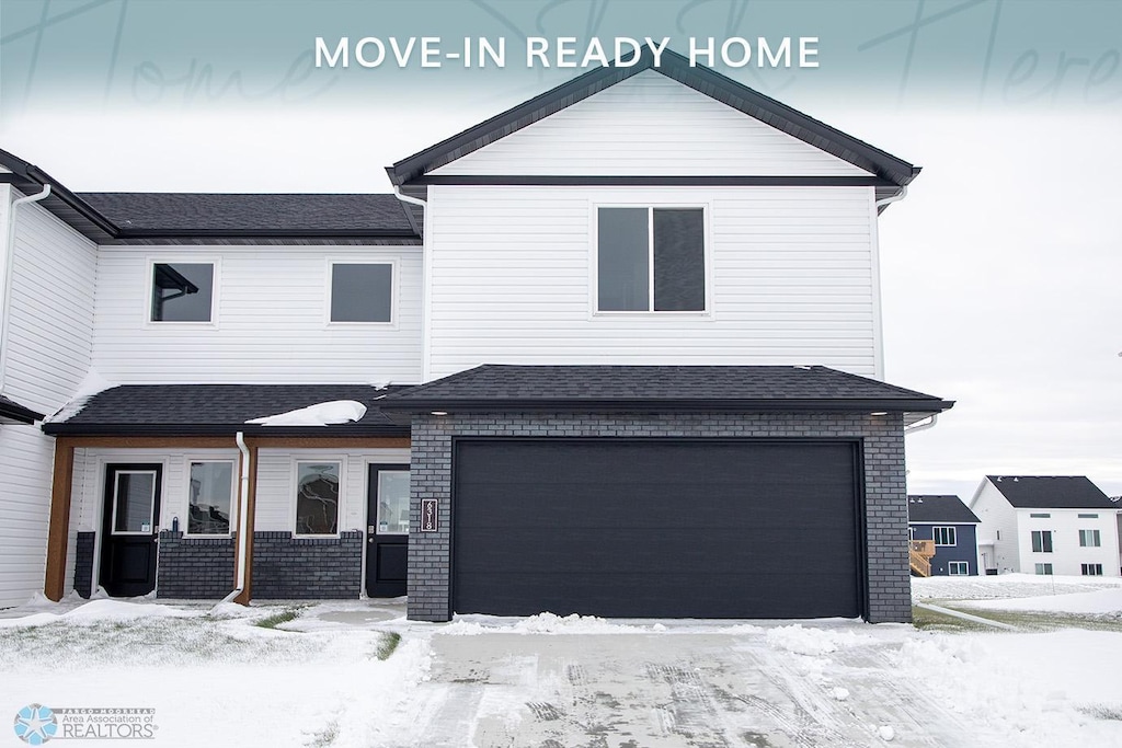 view of front of home with a garage