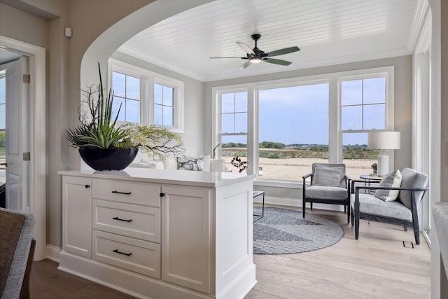 sunroom / solarium with ceiling fan