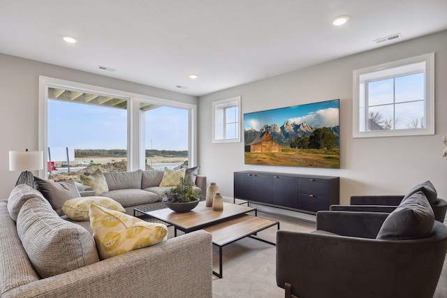 living room featuring light colored carpet