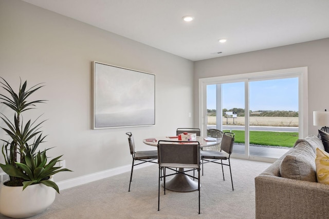 view of carpeted dining room