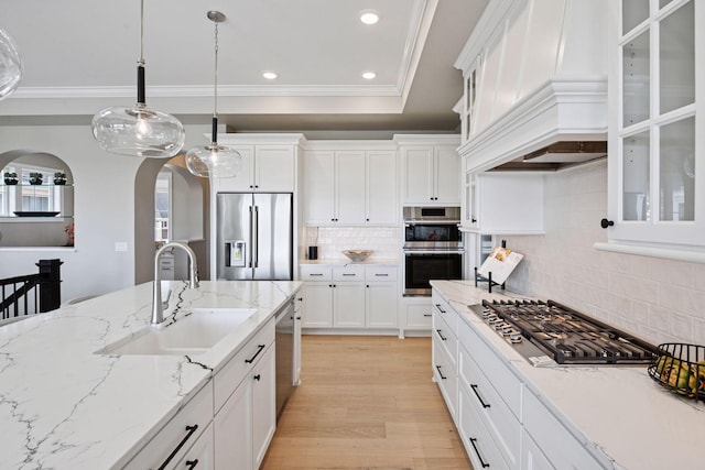 9155 Mills Dr, Chanhassen, MN 55317 - kitchen with pendant lighting, recessed lighting, a sink, white cabinets, and appliances with stainless steel finishes