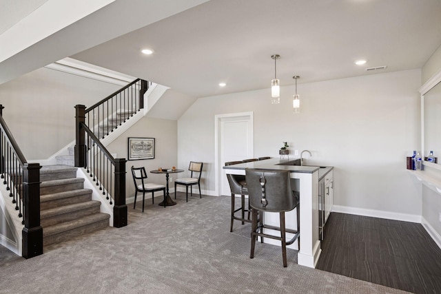 9155 Mills Dr, Chanhassen, MN 55317 - dining area with stairs, carpet floors, visible vents, baseboards, and recessed lighting