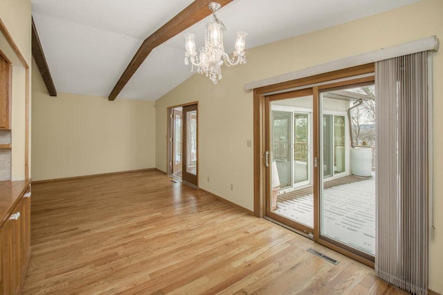 interior space with lofted ceiling with beams, a chandelier, and light wood-type flooring