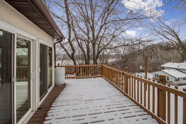 view of snow covered deck