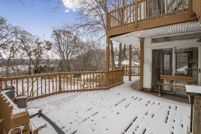 view of snow covered deck