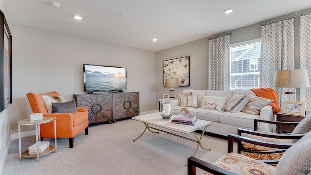 living room featuring light colored carpet