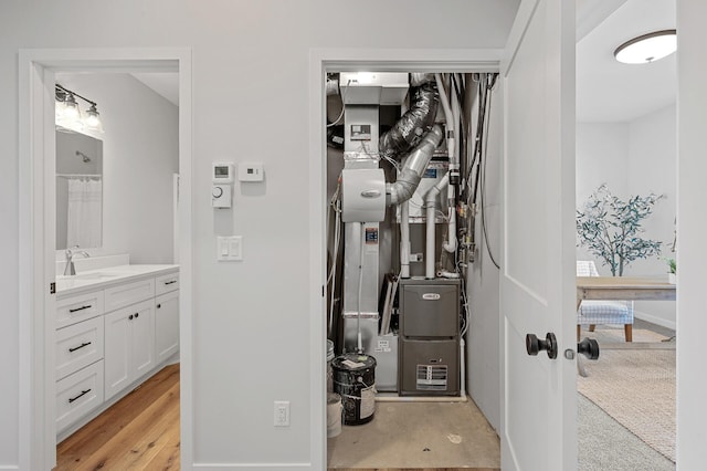 utility room featuring sink