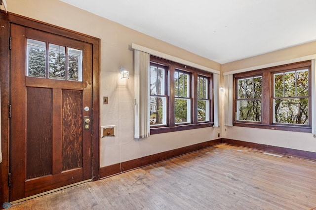 foyer entrance featuring hardwood / wood-style floors