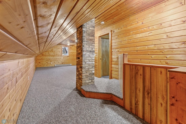 bonus room with wood walls, carpet floors, wooden ceiling, and vaulted ceiling