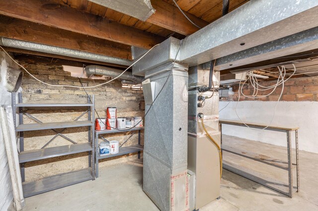 basement featuring heating unit