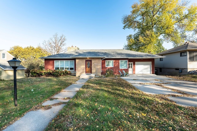 ranch-style house with a garage and a front lawn