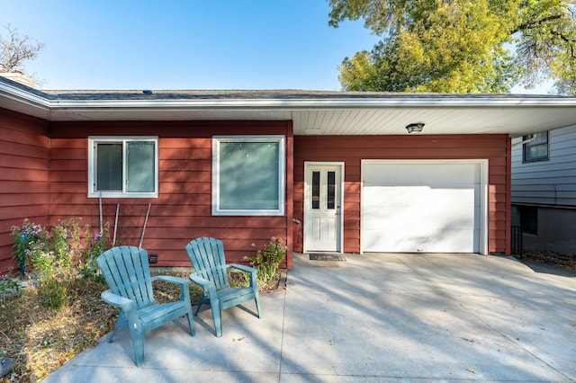 exterior space with a garage