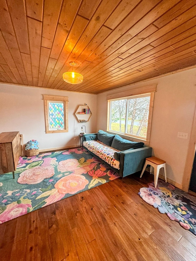 bedroom featuring hardwood / wood-style flooring and wooden ceiling