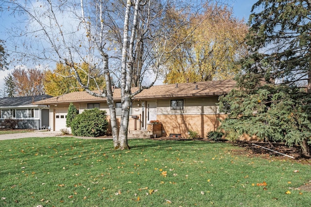 ranch-style home featuring a front yard