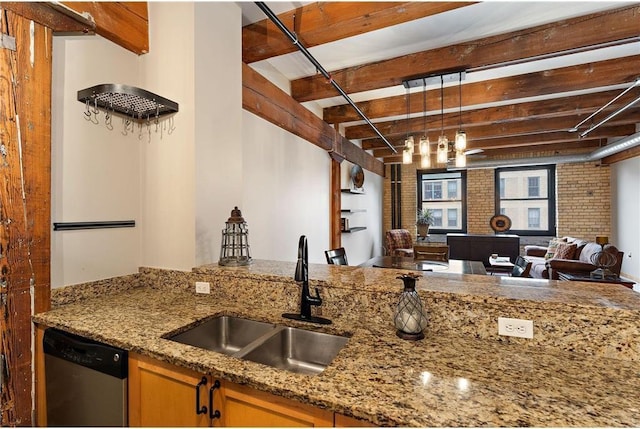 kitchen with decorative light fixtures, stone counters, sink, dishwasher, and brick wall