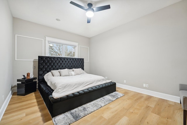 bedroom featuring ceiling fan and wood-type flooring