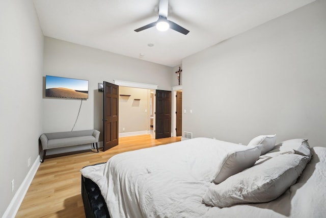 bedroom featuring hardwood / wood-style floors and ceiling fan