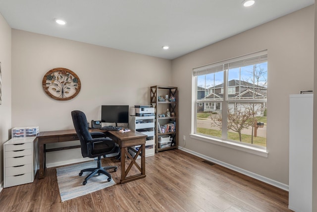 home office with baseboards, recessed lighting, and wood finished floors