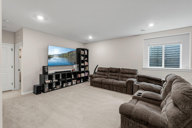 carpeted living area with recessed lighting, baseboards, and visible vents