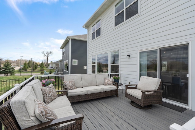 wooden terrace with outdoor lounge area