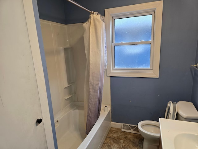 full bathroom with toilet, shower / tub combo, and vanity