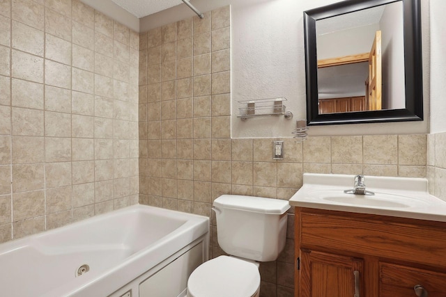 full bathroom with toilet, shower / bathing tub combination, tile walls, vanity, and a textured ceiling