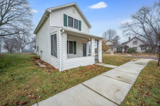 bungalow with a front lawn