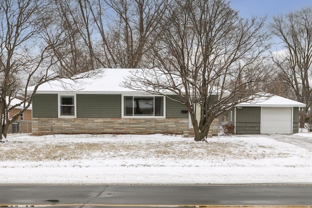 single story home featuring a garage