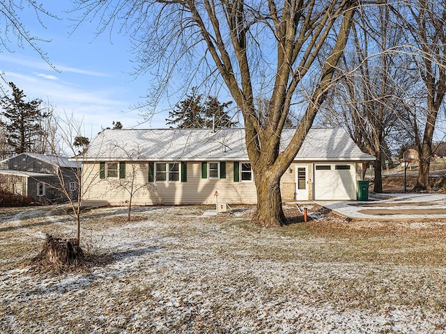 single story home with a garage