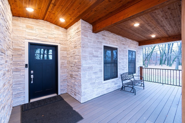 doorway to property with covered porch