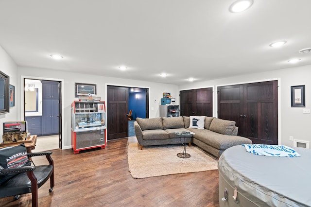 living room featuring dark hardwood / wood-style flooring