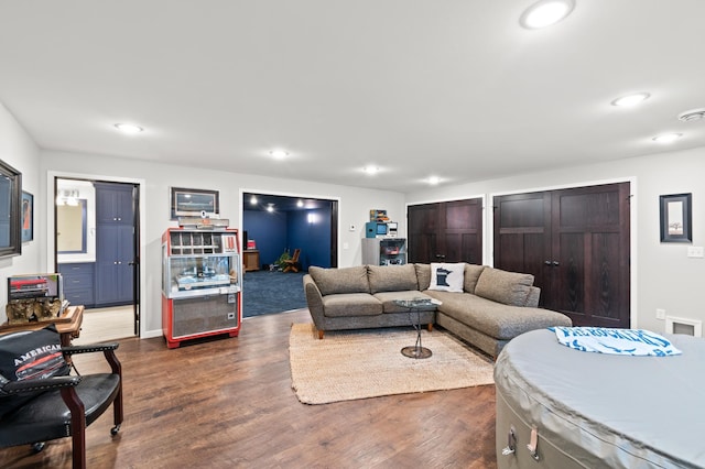 living room featuring dark hardwood / wood-style floors