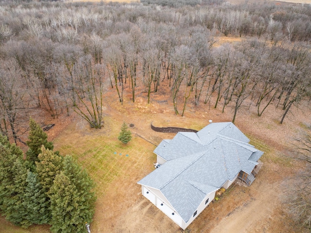 birds eye view of property with a rural view