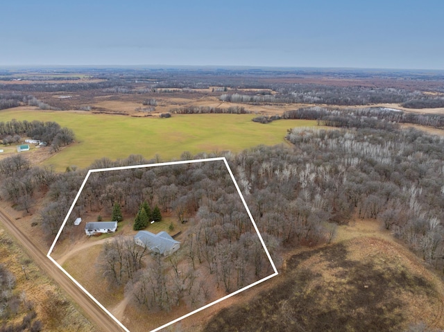 birds eye view of property featuring a rural view