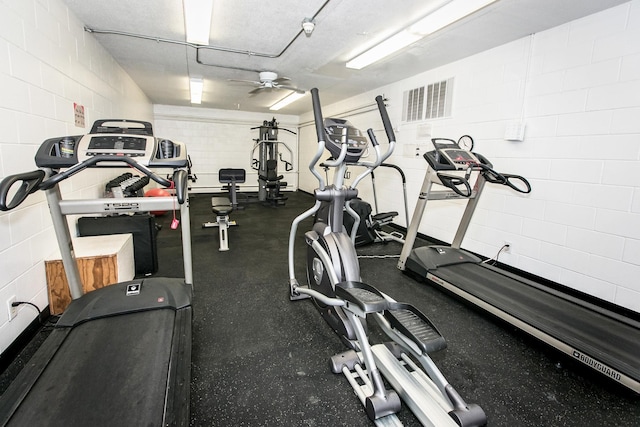 gym with ceiling fan