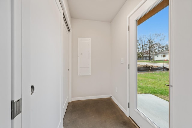 doorway to outside with electric panel