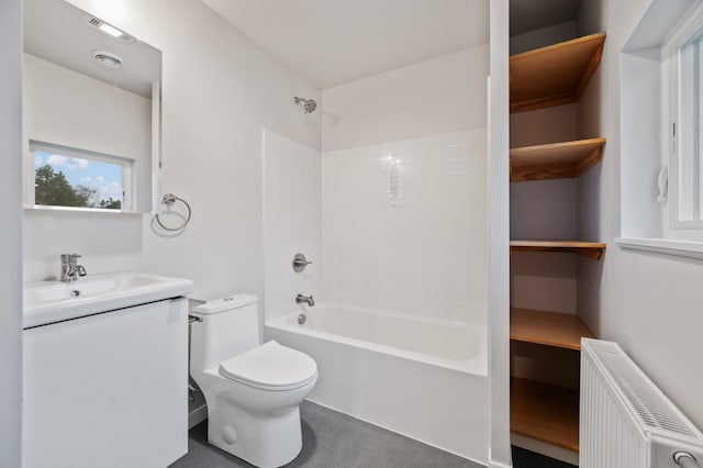 711 7th Ave, Grand Rapids, MN 55744 - full bath with radiator heating unit, vanity, and shower / washtub combination