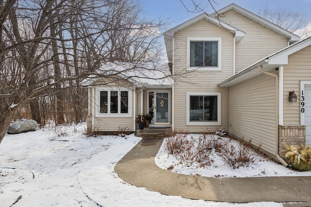 traditional-style home featuring a garage