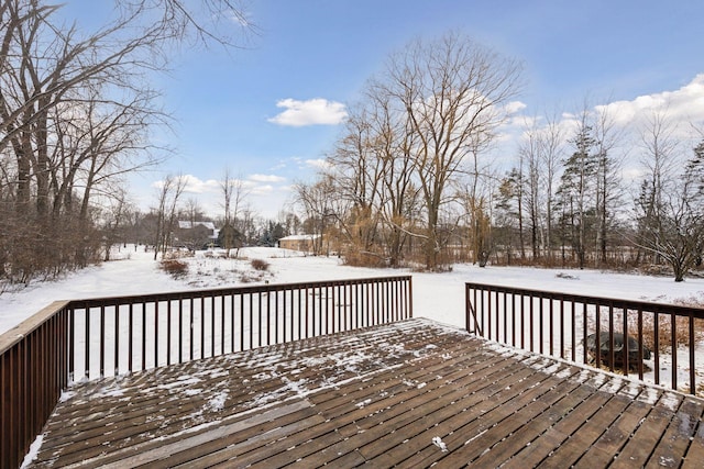 view of snow covered deck