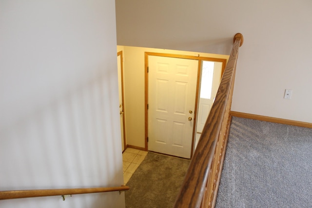 entryway with light carpet