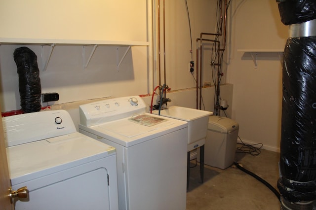 washroom with separate washer and dryer