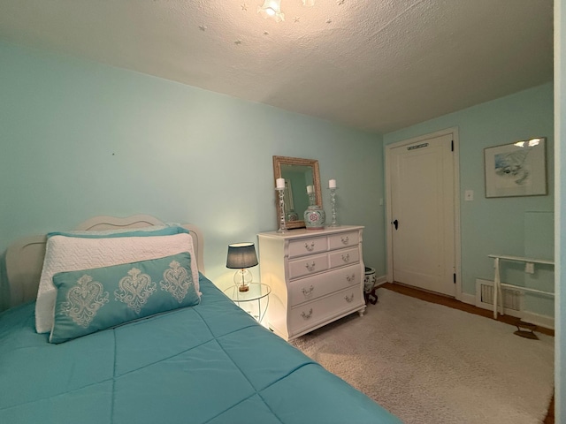 bedroom with a textured ceiling