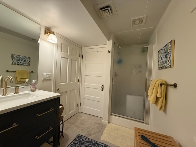 bathroom featuring vanity and walk in shower