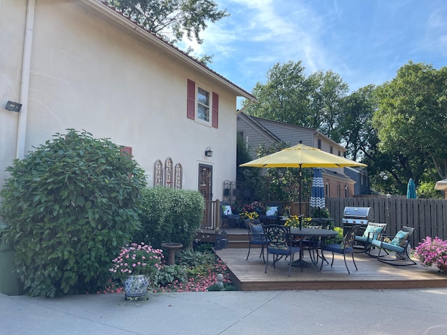 view of patio featuring area for grilling and a deck