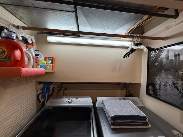 laundry room featuring separate washer and dryer