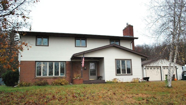 view of front property featuring a front lawn