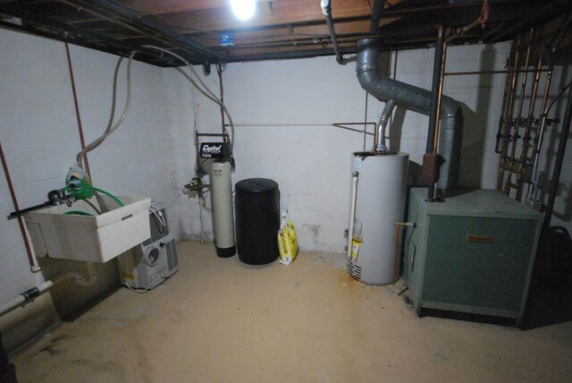 basement featuring gas water heater